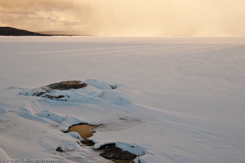 FIshing Cone Geyser and Yellowstone Lake at Sunset    West Thumb Geyser Basin, Yellowstone National Park, Wyoming